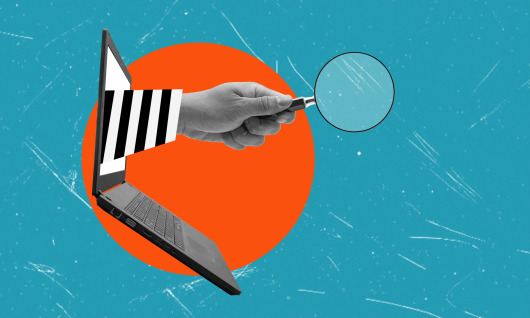 Modern art collage depicting a scammer's hand with a magnifying glass from a laptop on a blue background. The concept of fraud on the Internet.