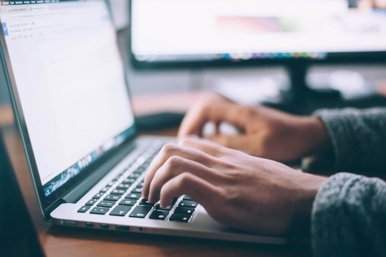 typing at a computer