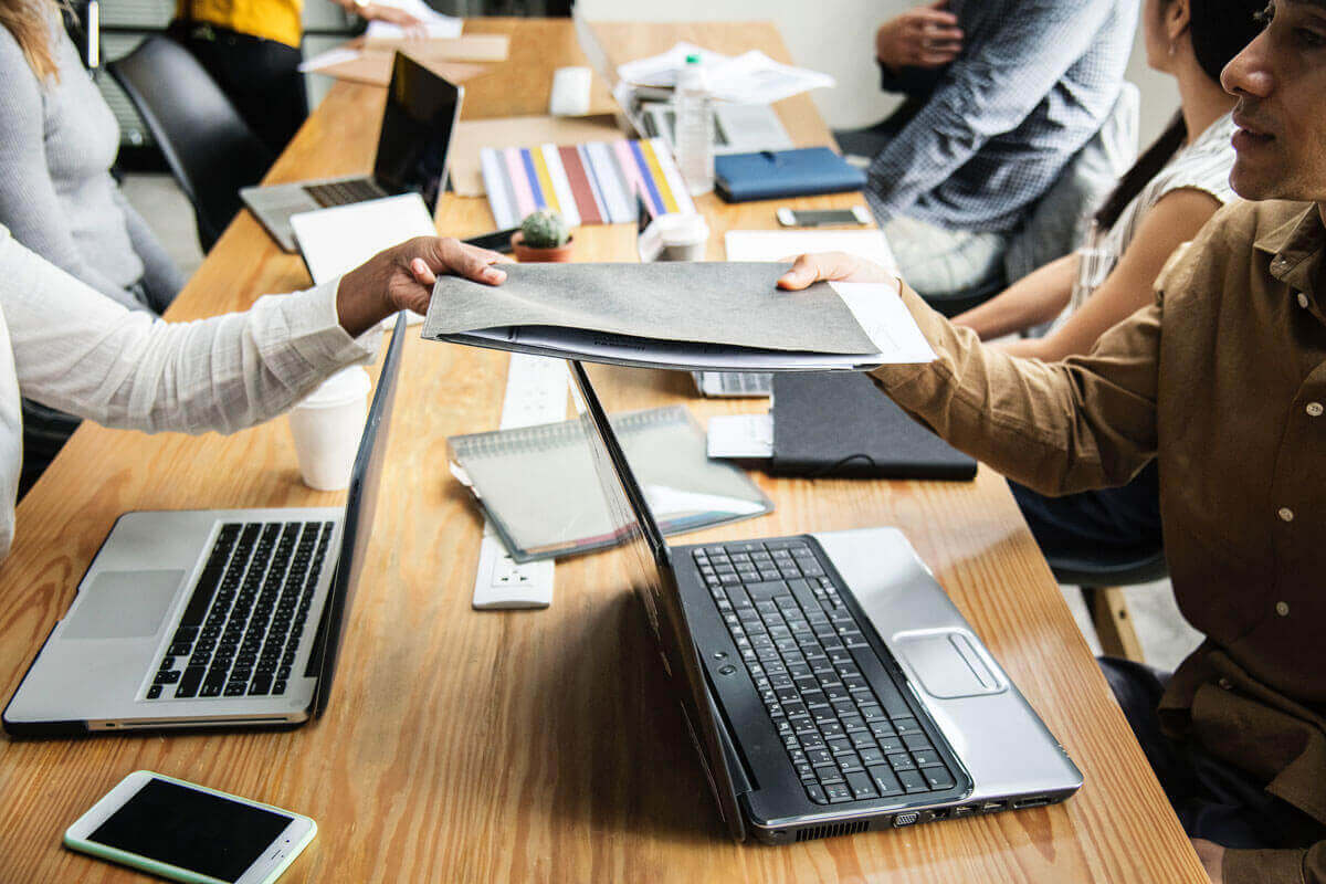 group of employees working at a table