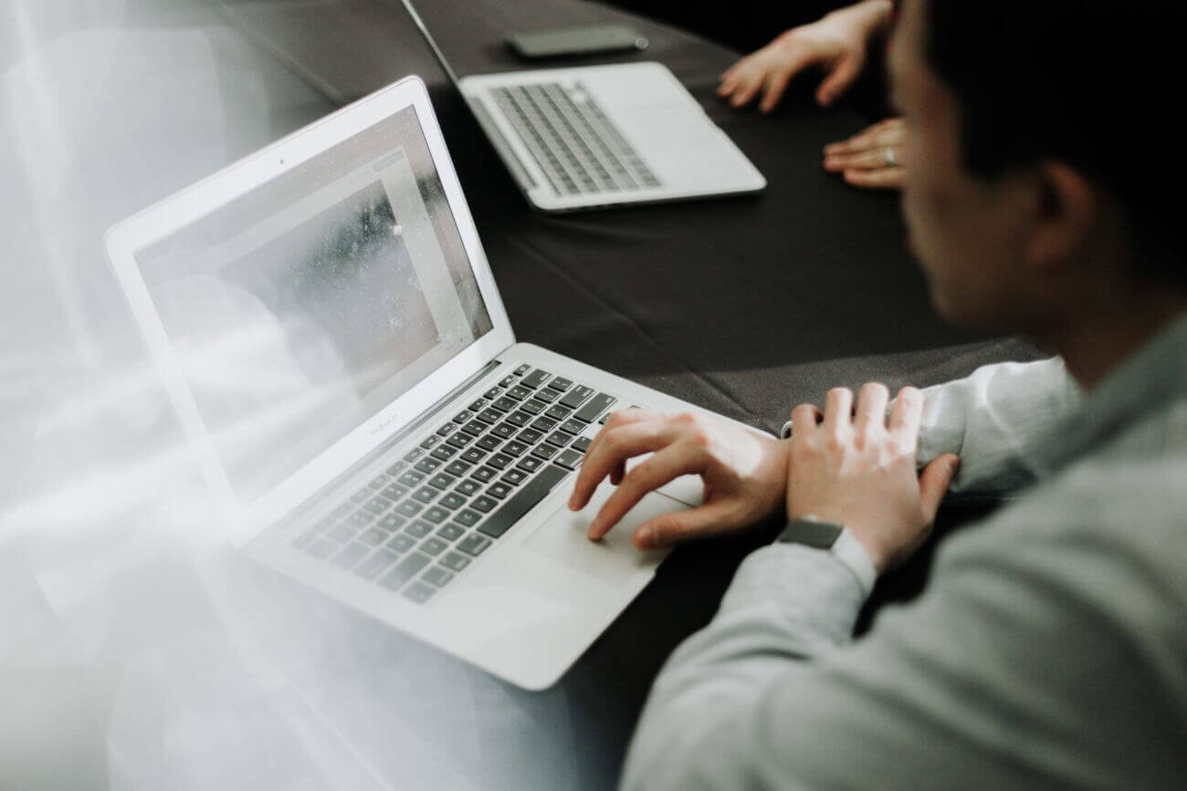 woman typing on a computer