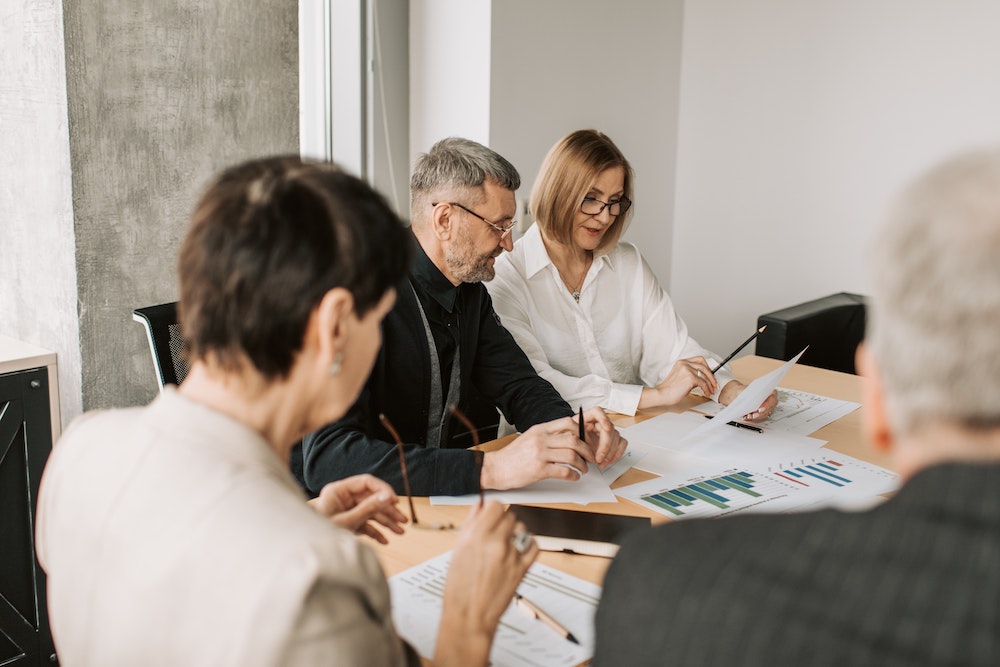 Company Meeting going over how to conduct effective performance reviews