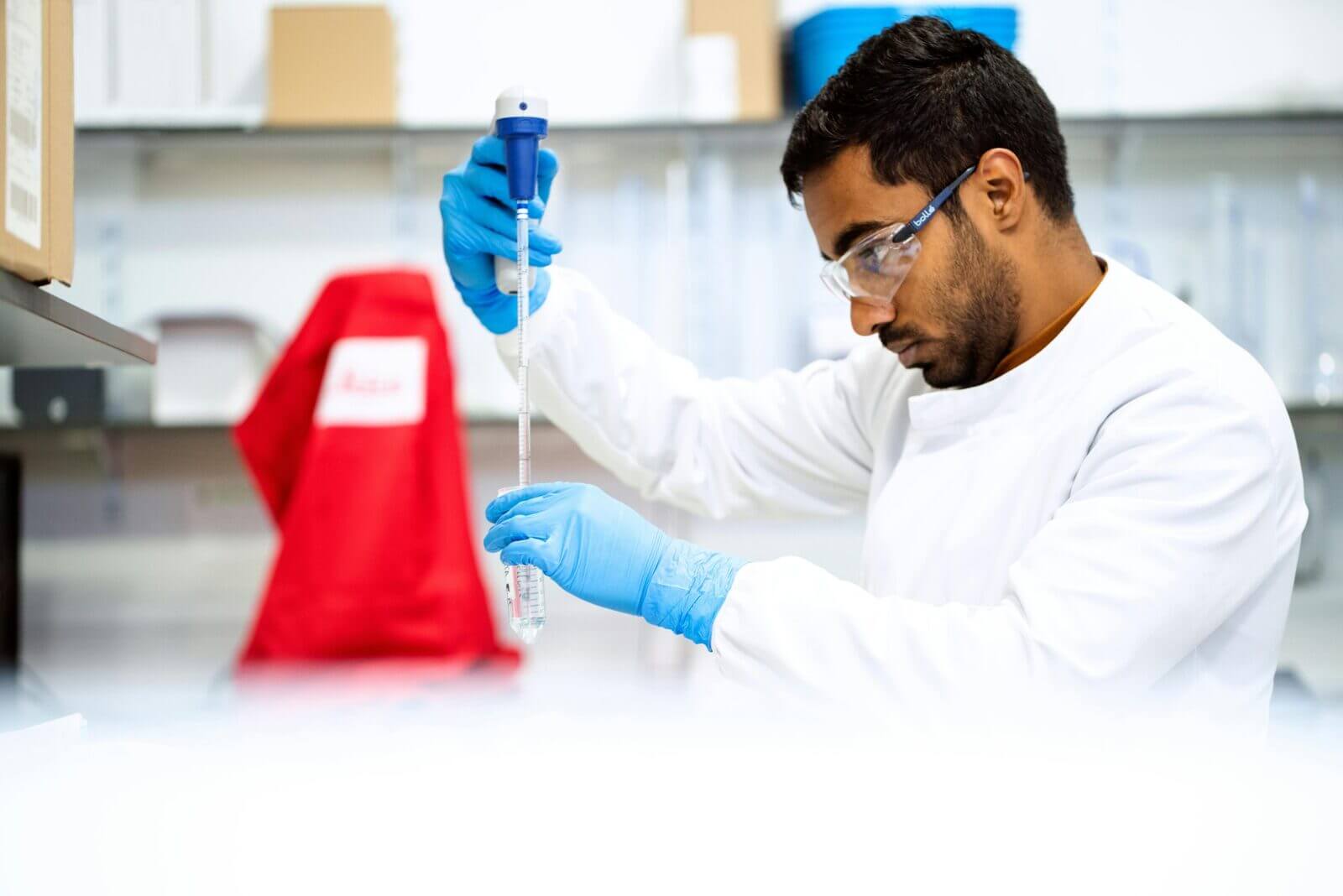 A man in the laboratory working on a chemical experiment in one of the most in-demand scientific jobs of 2024