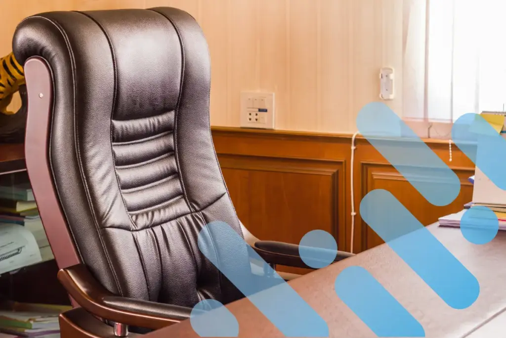 Empty executive chair with branding overlay.